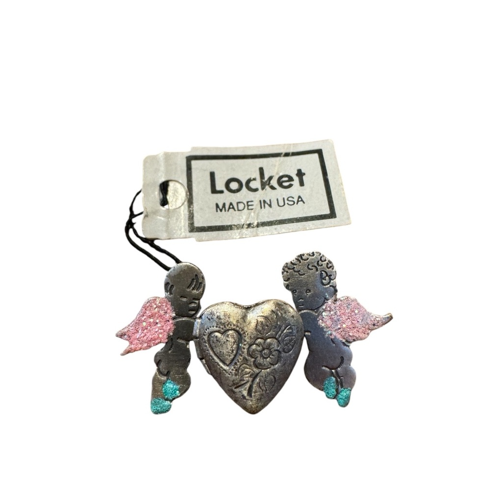 Small tiny angels with a heart locket brooch